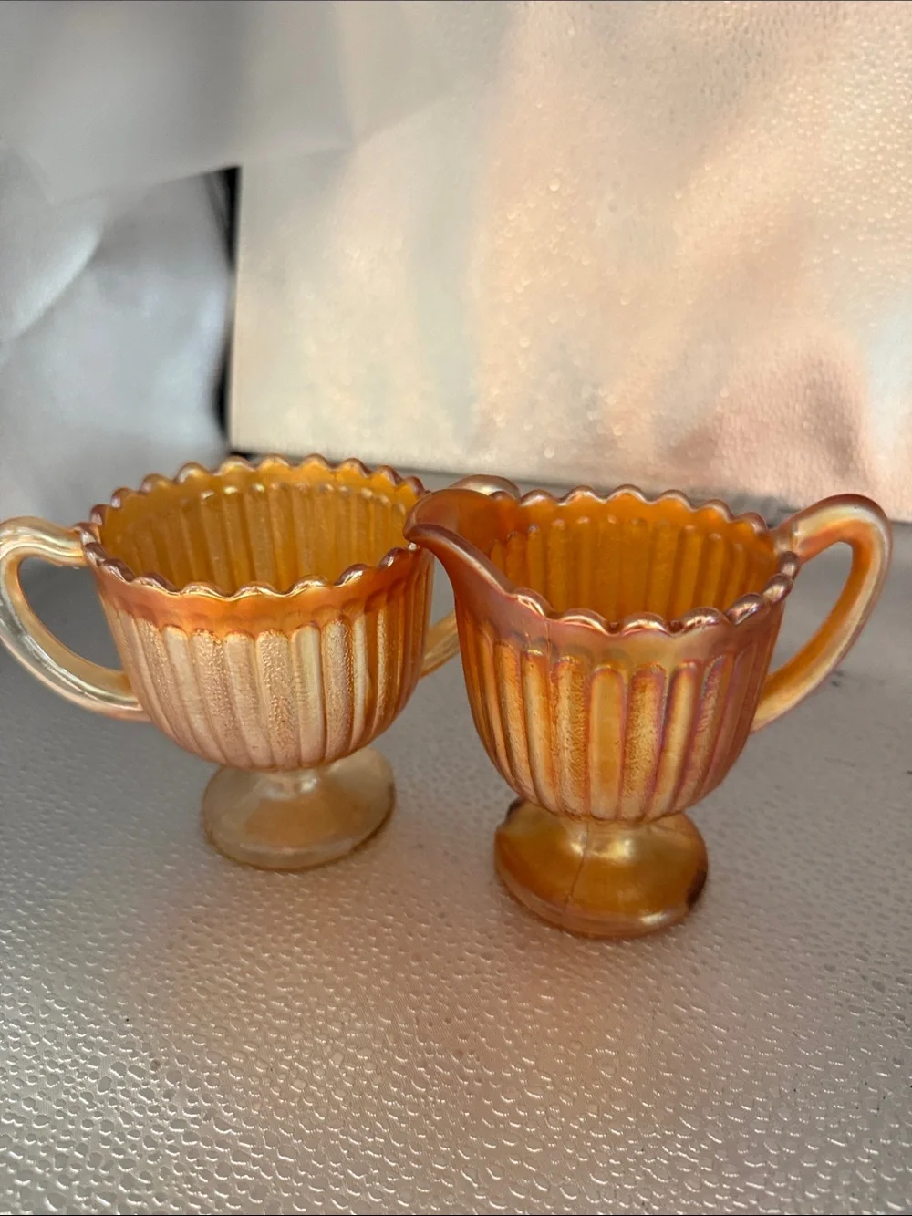 Vintage “Striped Rays” Carnival Glass sugar and creamer set.